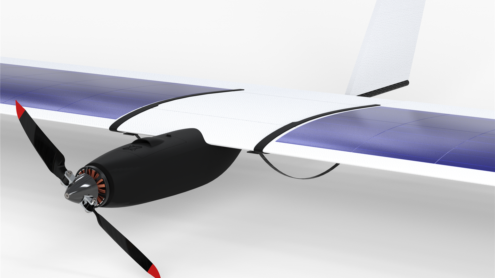 Detailansicht weiße Vectro Robotics Waldbranderkennungs UAV Dohne FireHound 11 frontal mit propeller und Solarzellen